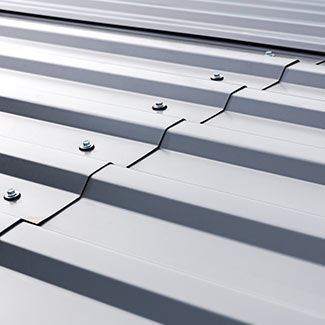 Stephens Commercial Painting Elastomeric Roof Coating Application for Metal Roof